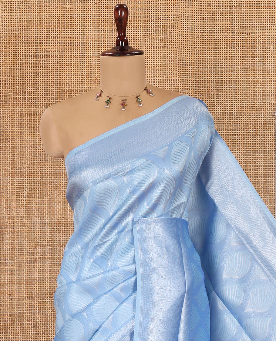 Blue Elite Soft Silk Saree, Subtly Sparkled with Ogee Jacquard Design, a Traditional Zari Border, Zari Pallu, and a Matching Blouse