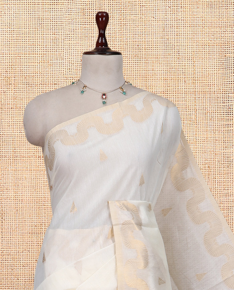 Cream Chanderi Cotton Saree, Adorned with Zari Buttas, Highlighted by Zari Border, Grand Pallu, and a Matching Blouse