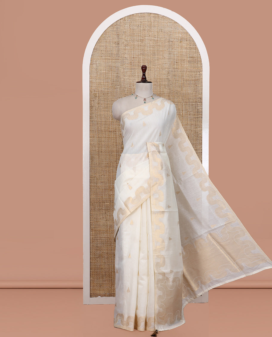Cream Chanderi Cotton Saree, Adorned with Zari Buttas, Highlighted by Zari Border, Grand Pallu, and a Matching Blouse