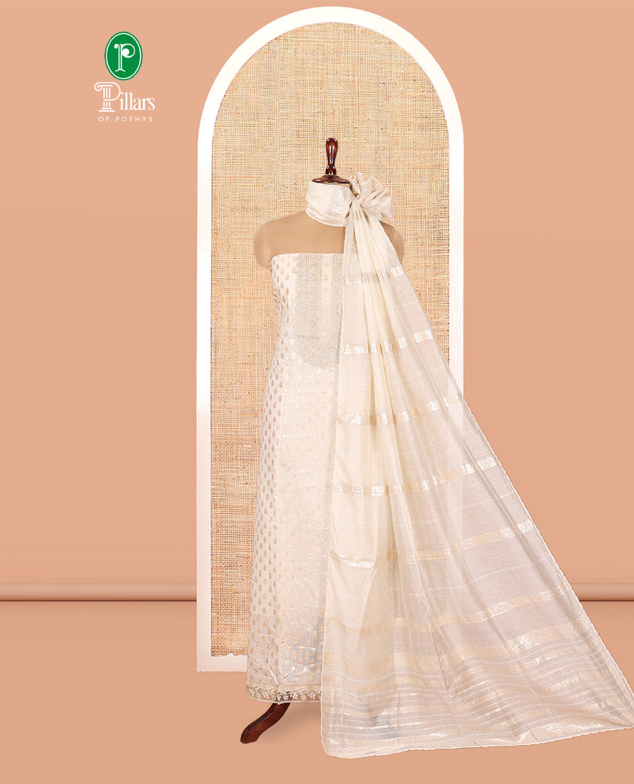Chikku Chanderi Material Chudidar Features Buttas and Neckwork Top, a Matching Blouse, Matching Dupatta