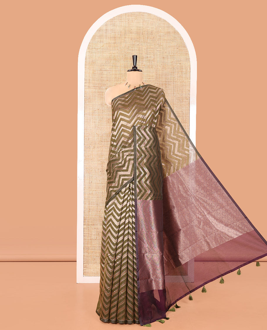 Borderless Green Chanderi Cotton Saree, Enriched with Chevron Zari Stripes on Its Body, Complemented by Contrast Intricate Jaal Pallu, and Paired with Contrast Blouse