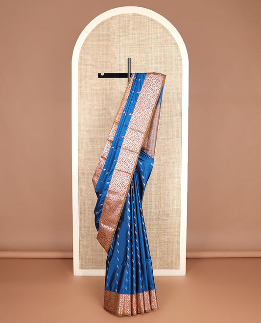 Blue zari buttas soft silk saree, contrast floral design zari border, and jaal pallu