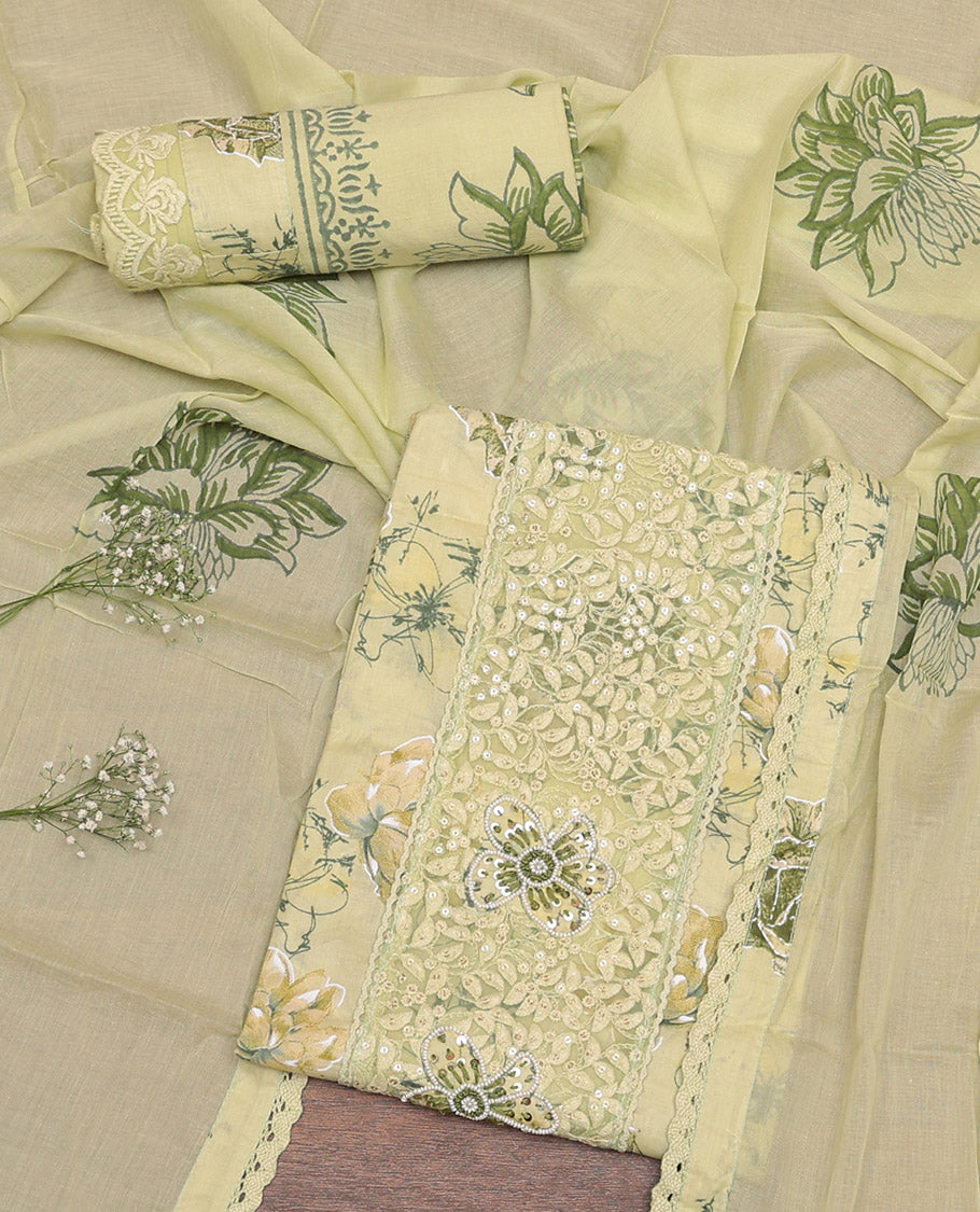 Yellow Cotton Material Churidar Set Features Floral Print and Floral Embroidery Top, Printed Bottom, and Floral Printed Dupatta