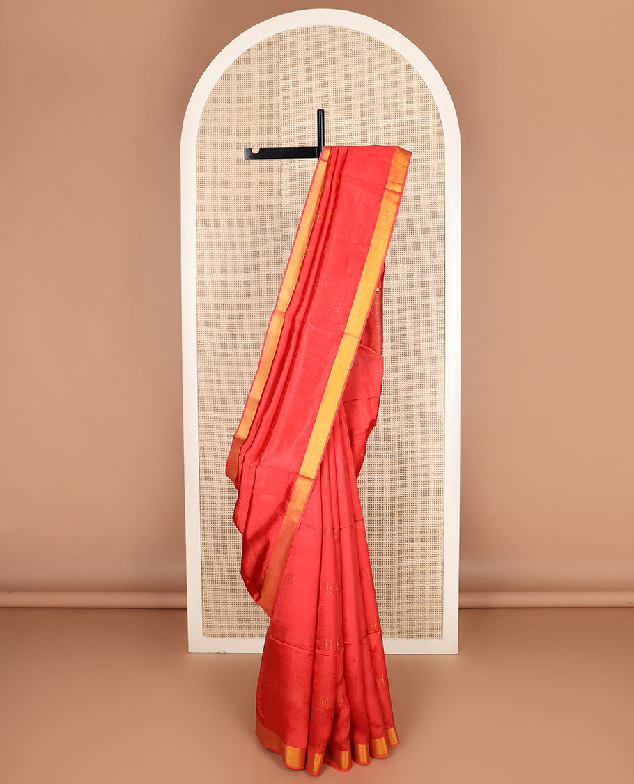 Red buttas banana pith saree, bavanji zari border, and zari striped pallu