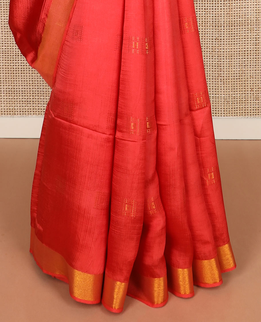 Red buttas banana pith saree, bavanji zari border, and zari striped pallu