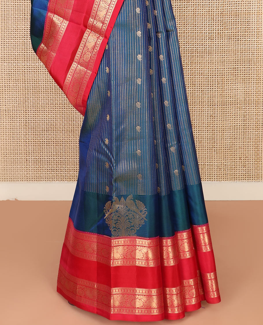 Blue Vasundhara Silk Saree Elegantly Detailed with Zari Buttas and Zari Micro-Checks, Complemented by a Contrast Rettai Pettu Border of Muthu, Rudraksham, and Kodi Mayil Designs, Pallu Steeped Kathir Designs, and a Contrast Blouse