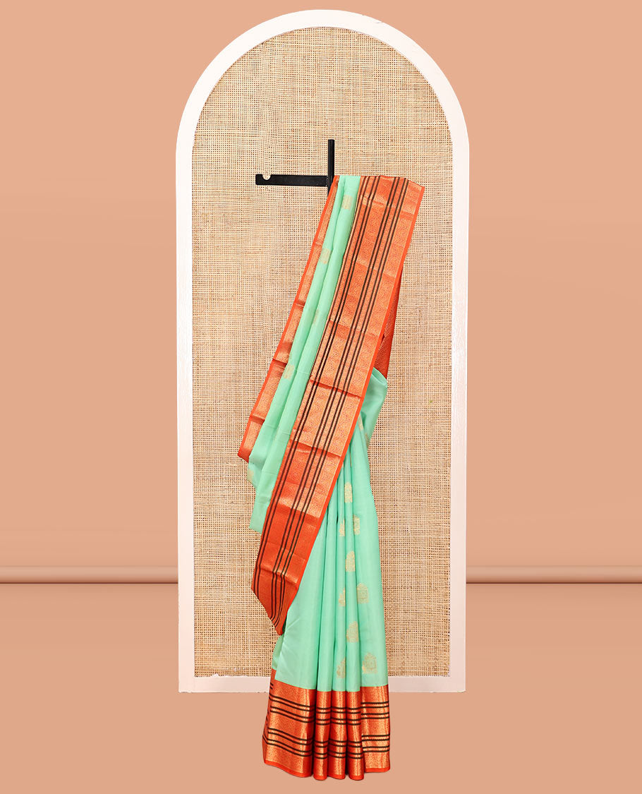 Turquoise Vasundhara Silk Saree, Finely Crafted with Zari Buttas, Complemented by a Contrast Border of Mayil, Neli, and Rudraksham Designs, Grand Pallu, and a Contrast Blouse