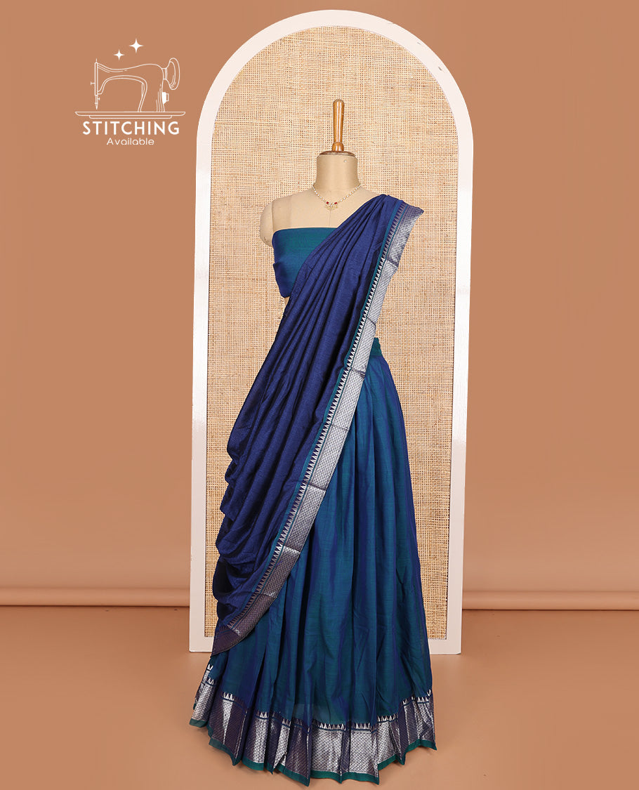 Blue cotton half-saree, plain with contrast traditional zari bordered skirt, matching blouse, and contrast zari border dhavani