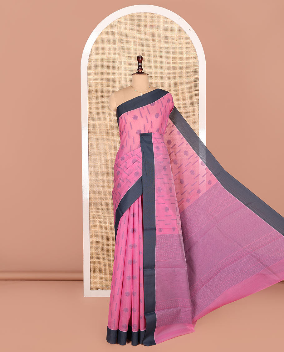 Pink Semi-Silk Cotton Saree, Subtly Sparkled with Buttas All Over Its Body, Complemented by Contrast Border, Geometric Patterned Pallu, and Paired with a Matching Blouse