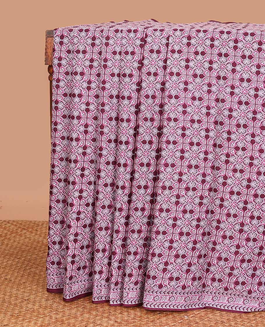 Purple intricately printed mul mul cotton saree, geometric printed border, and pallu