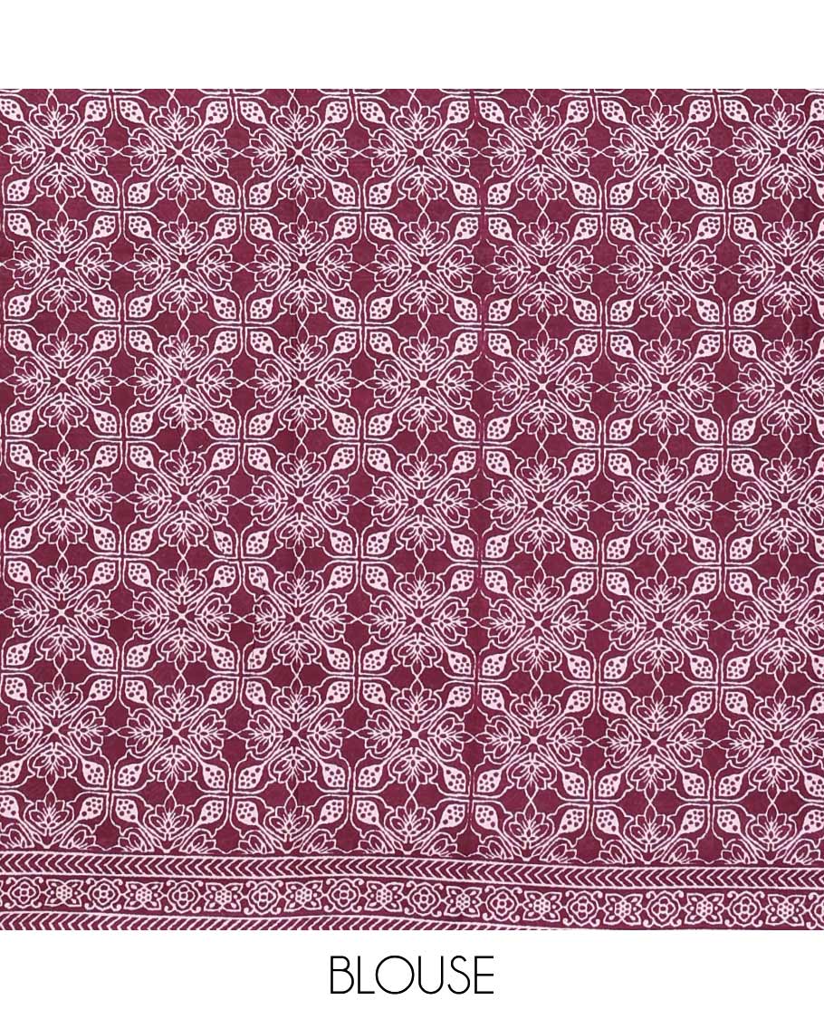 Purple intricately printed mul mul cotton saree, geometric printed border, and pallu