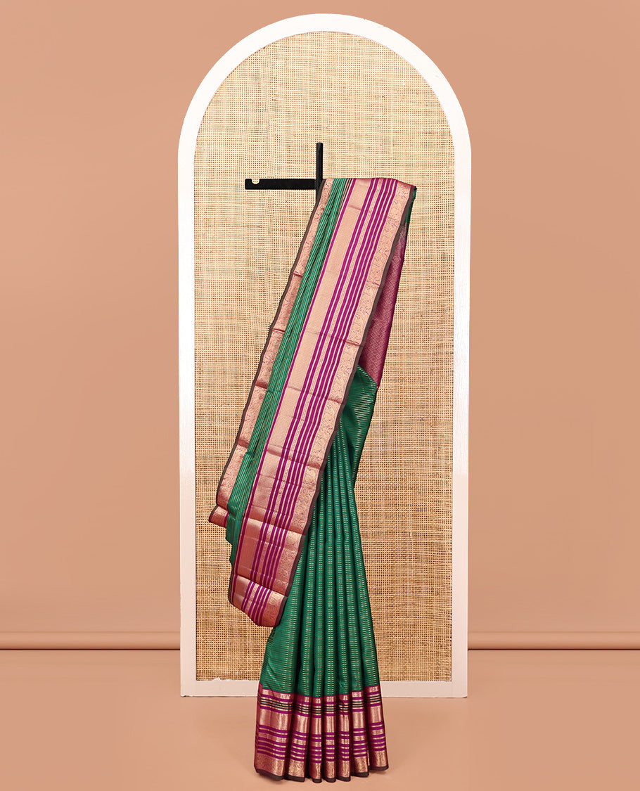 Green-Magenta Vasundhara Silk Saree Features Veldhari and Muthu Stripes, Contrast Border of Muthu,Lavangam,Neli,Mayil Kann, and Mayil, Grand Pallu, and Contrast Blouse