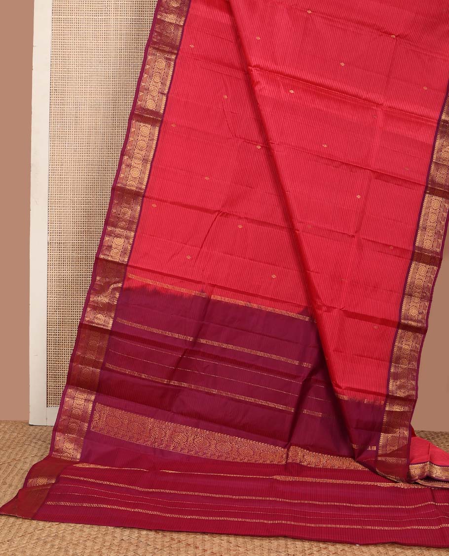 Pink striped and buttas Kanchipuram silk saree, contrast border of thilakam mokku, muthu, jadai nagam, and kili motifs and traditional zari design pallu