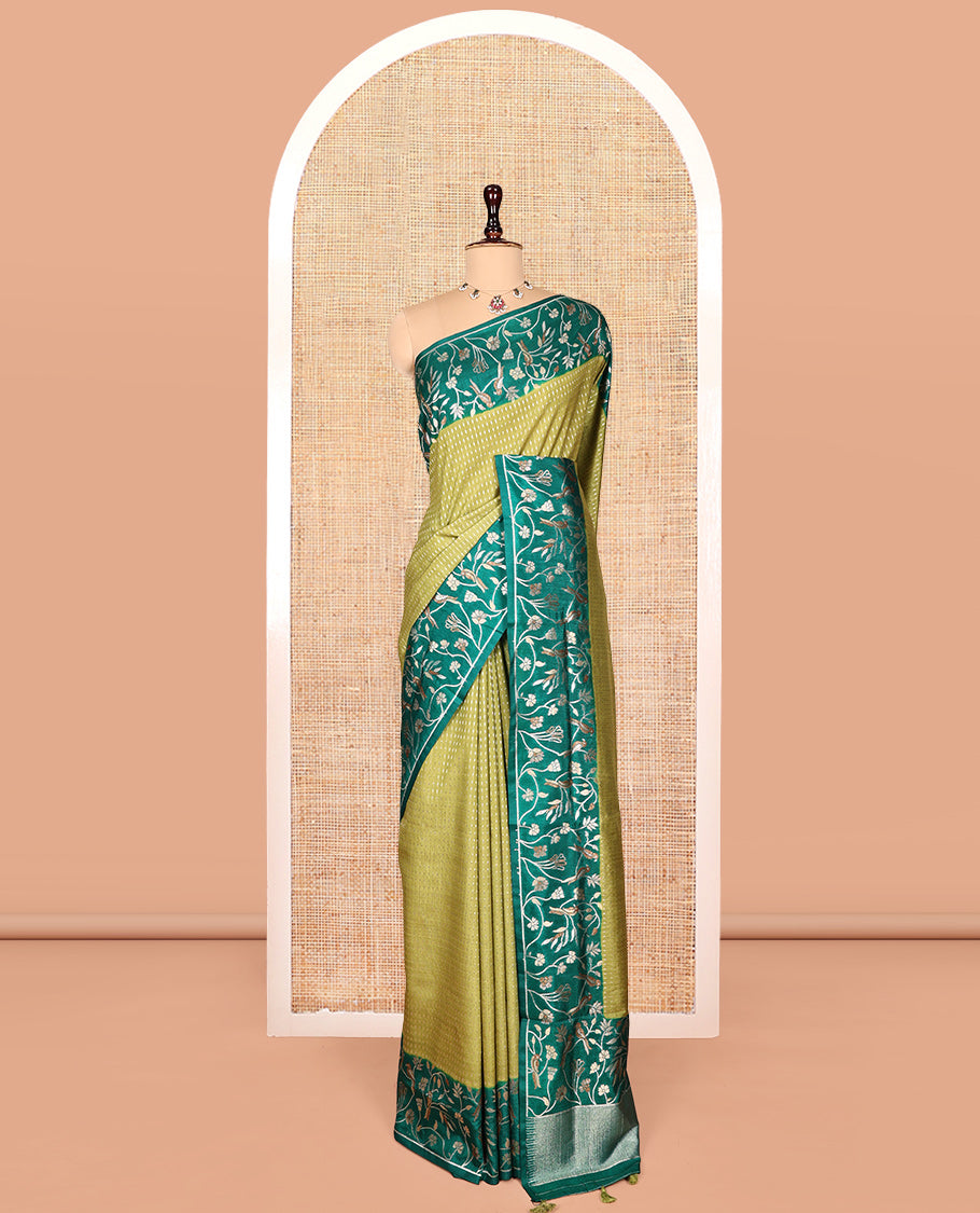 Green Matka Silk Saree, Finely Crafted with Buttas on Its Body, Complemented by Contrast Floral Vine and Bird Design Border, Pallu of Floral Vine and Bird Design, and Paired with a Contrast Blouse