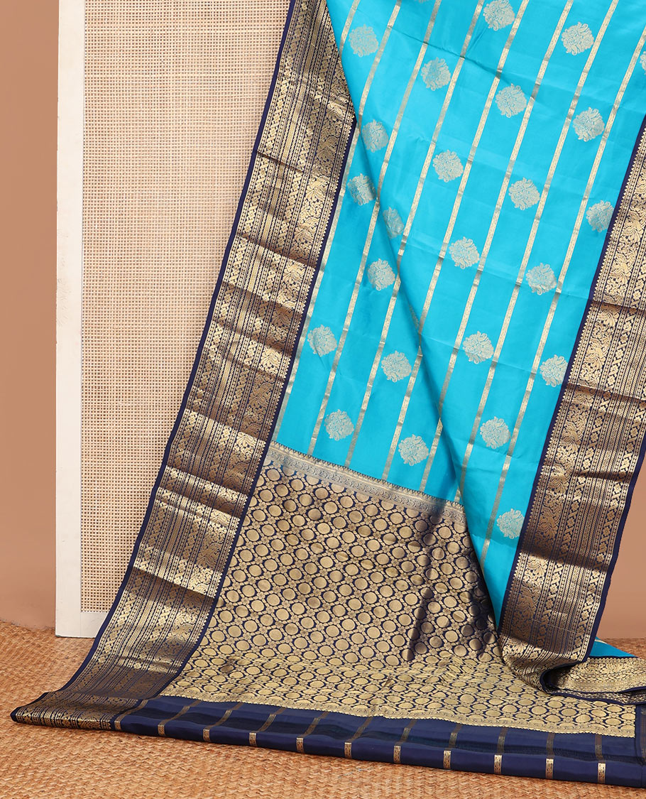 Blue thick zari striped Vasundhara silk mix saree, contrast border of rekku,mayil,neli,kathir & cross kamalam & intricate pallu