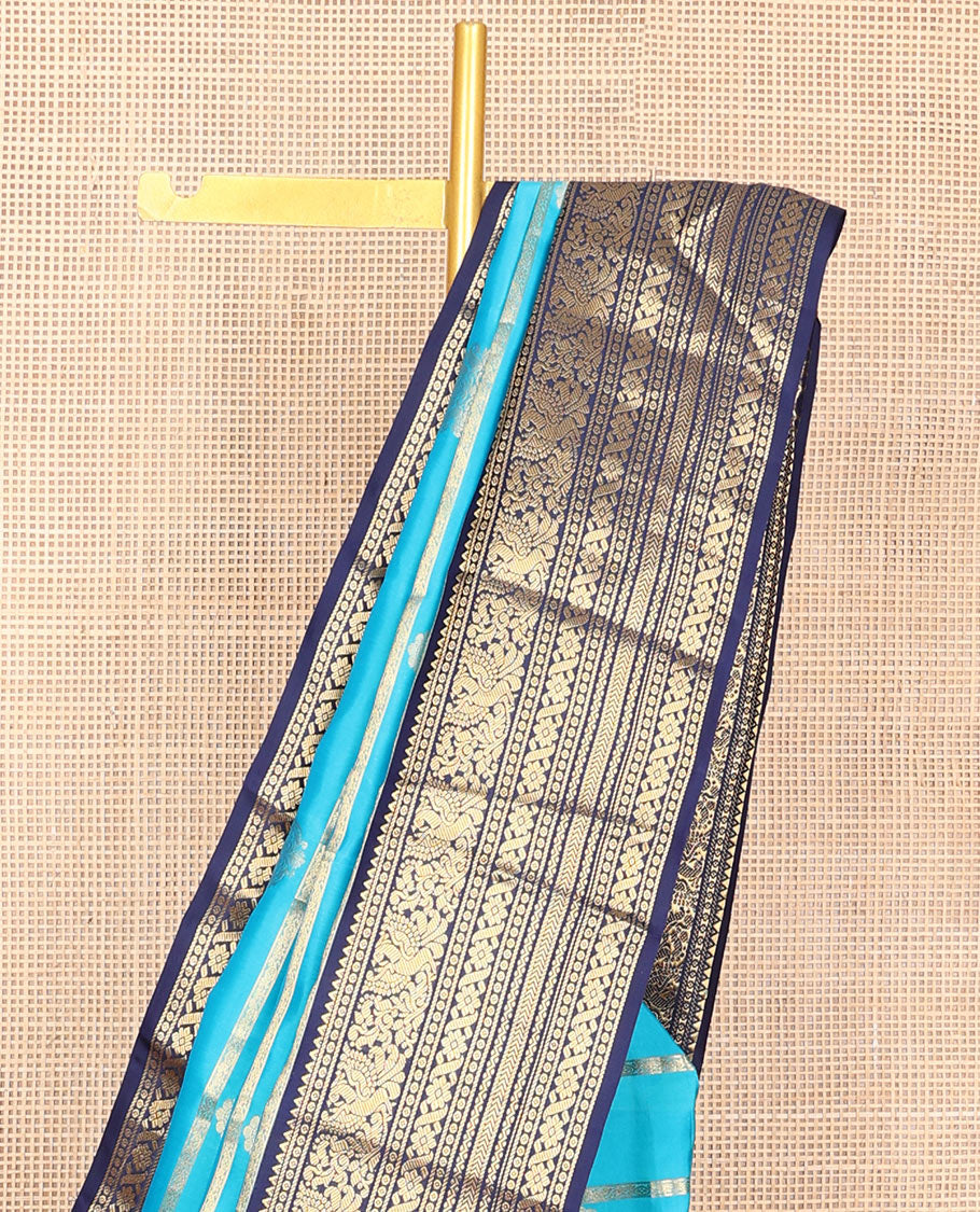 Blue thick zari striped Vasundhara silk mix saree, contrast border of rekku,mayil,neli,kathir & cross kamalam & intricate pallu