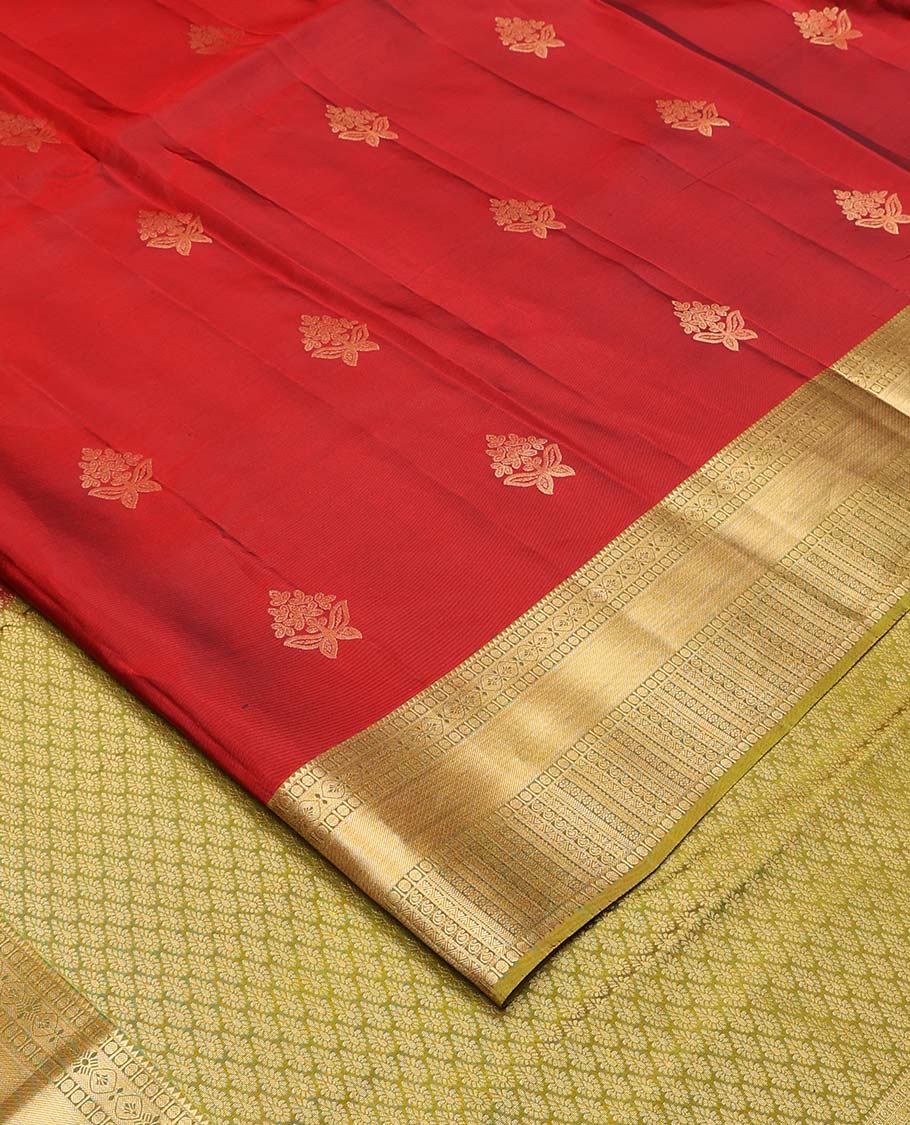 Red zari buttas Vasundhara silk mix saree, contrast border of rekku, poun, mayil kann, neli, and manga designs, and intricate pallu
