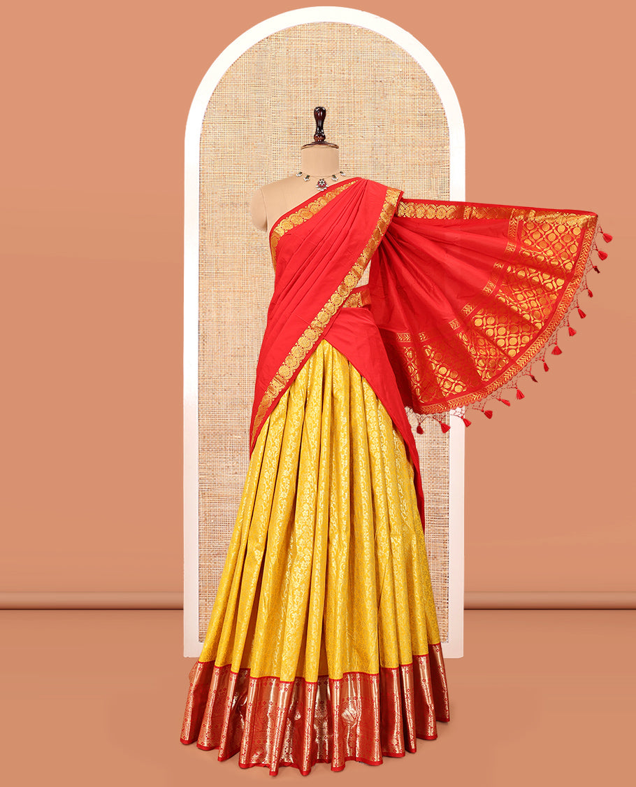 Yellow Art Silk Material Half Saree, Sparsely Sparkled with Jacquard Skirt, a Contrast Traditional Zari Border, Contrast Blouse, and an Intricate Dhavani