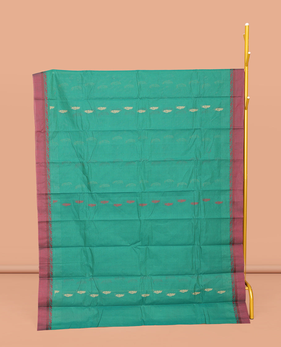 Green Kanchi Cotton Saree, Finely Crafted with Buttas All Over Its Body, Complemented by Contrast Border, Pallu of Floral Designs, and Paired with a Matching Blouse