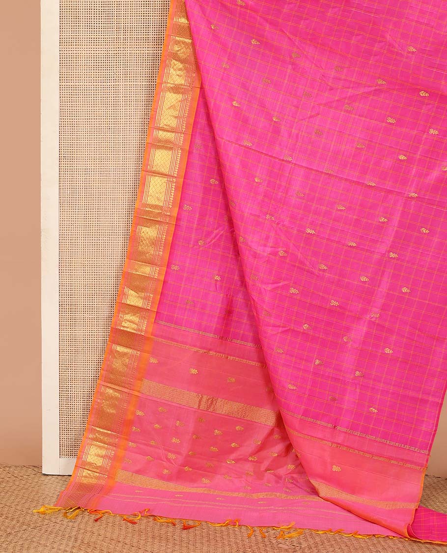 Pink checked and zari buttas Kanchipuram silk saree, contrast one-sided border of paneer sombu, banaras, muthu, and jaal design, and zari design pallu