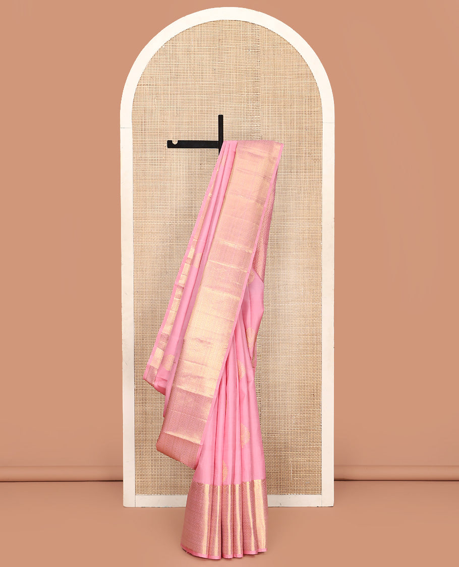 Pink Kanchipuram Silk Saree, Enthralled with Zari Buttas All Over Its Body, Highlighted by a Zari Border of Traditional Designs, Grand Jaal Pallu, and Paired with a Matching Blouse