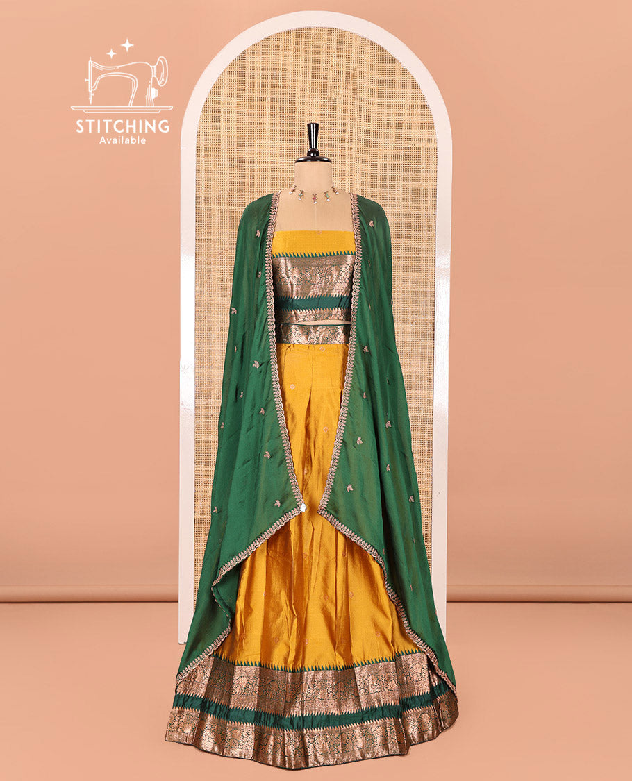 Yellow-Green Semi-Banarasi Half-Saree Subtly Sparkled with Zari Buttas on Its Skirt, Complemented by a Contrast Traditional Zari Temple Rettai Pettu Border, Paired with a Matching Blouse, and a Satin Georgette Embroidered Scallop Dhavani