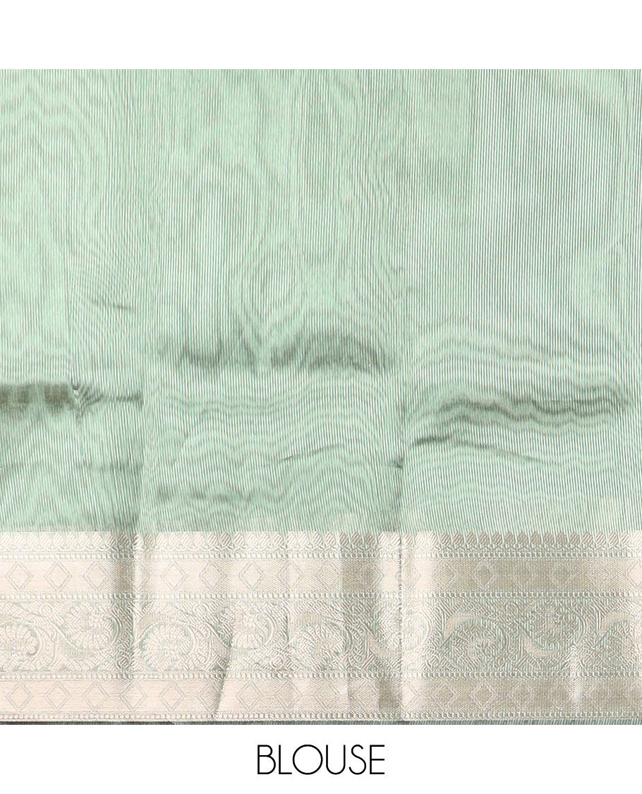 Dark green tissue saree with self zari design border & intricate zari design pallu