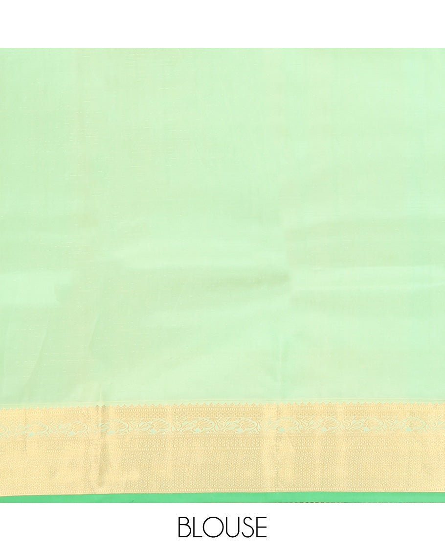 Brown Vasundhara Silk Saree, Detailed with Mayil and Chakram Buttas Enclosed Checks, Complemented by Contrast Border of Rekku, Mayil Kann, and Mayil Manga Designs, Grand Jaal Pallu and Paired with a Contrast Blouse