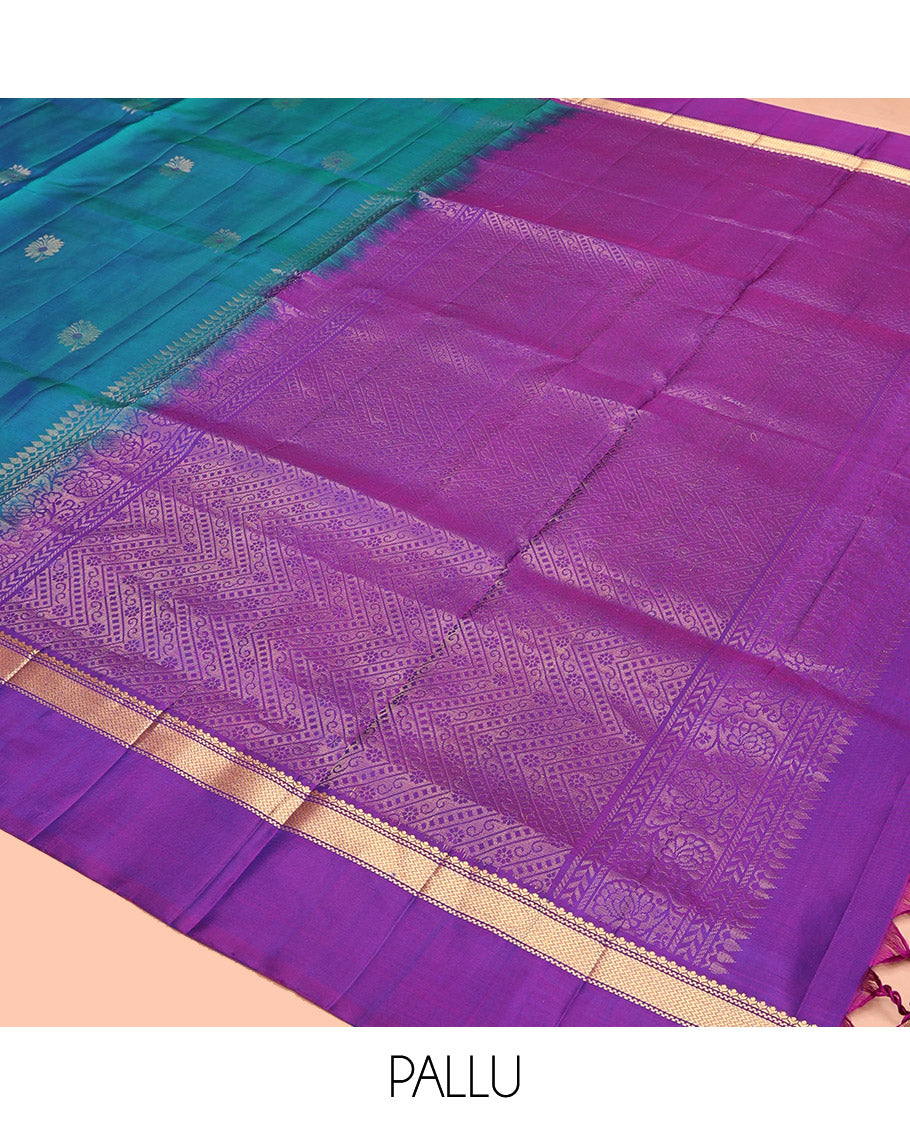Blue Mayuri Soft Silk Saree Spotlighted with Zari Buttas All Over Its Body, Complemented by Kal Erangina Border of Vanki Designs, Diagonally Woven Pallu and Paired with a Contrast Blouse
