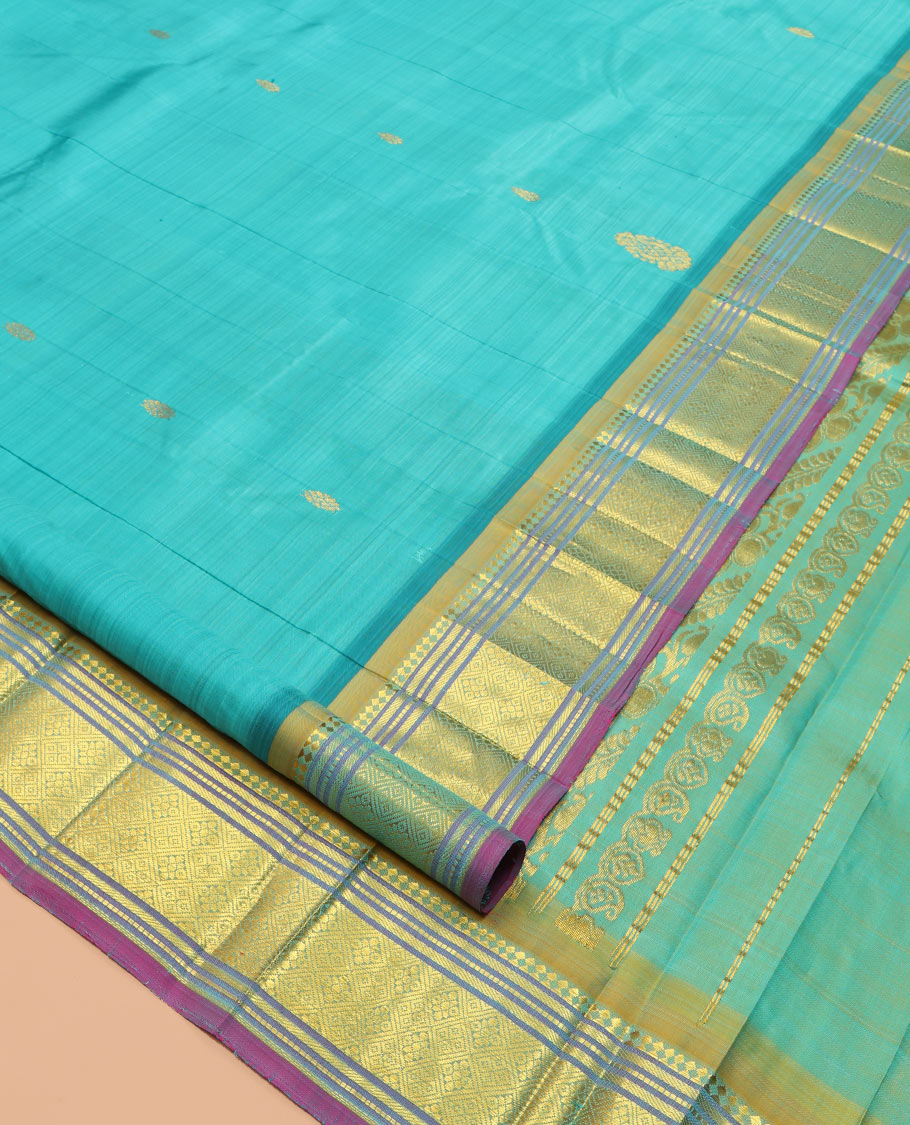 Blue Kanchipuram Silk Saree, Woven with Zari Buttas, a Contrast One-Sided Border of Panner Sombu, Banaras, Muthu, and Jaal Designs, Kodi Visiry Pallu, and a No Blouse