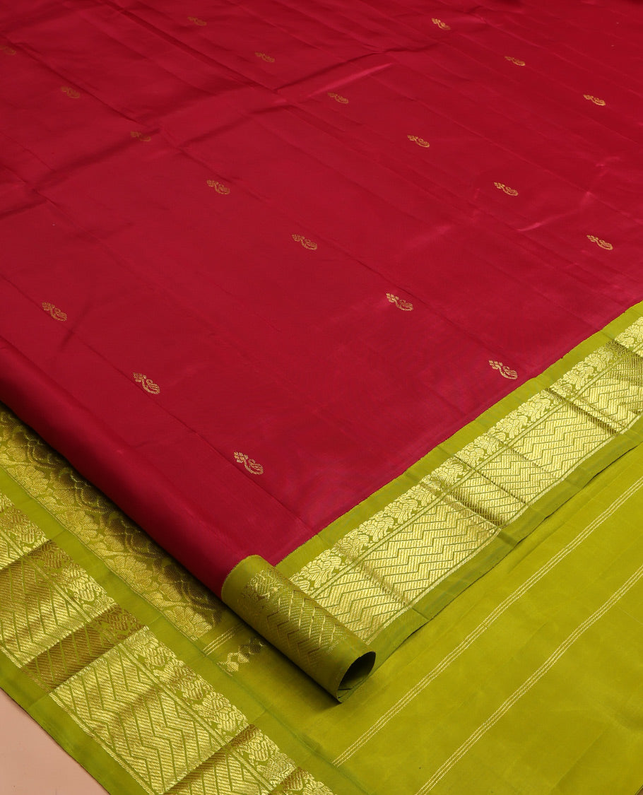 Light Maroon Kanchipuram Silk Saree, Detailed with Zari Buttas, a Contrast Korvai One-sided Border of Mayil, and Strip Designs, Pallu of Floral Designs, and No Blouse