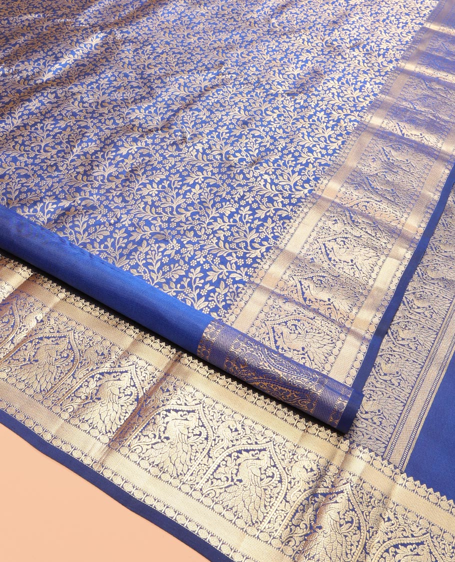 Blue Kanchipuram Wedding Silk Saree, Elegantly Highlighted with Jacquard Design, a Zari Border of Rekku, Muthu, Poun and Mayil Designs, Grand Pallu, and a Matching Blouse