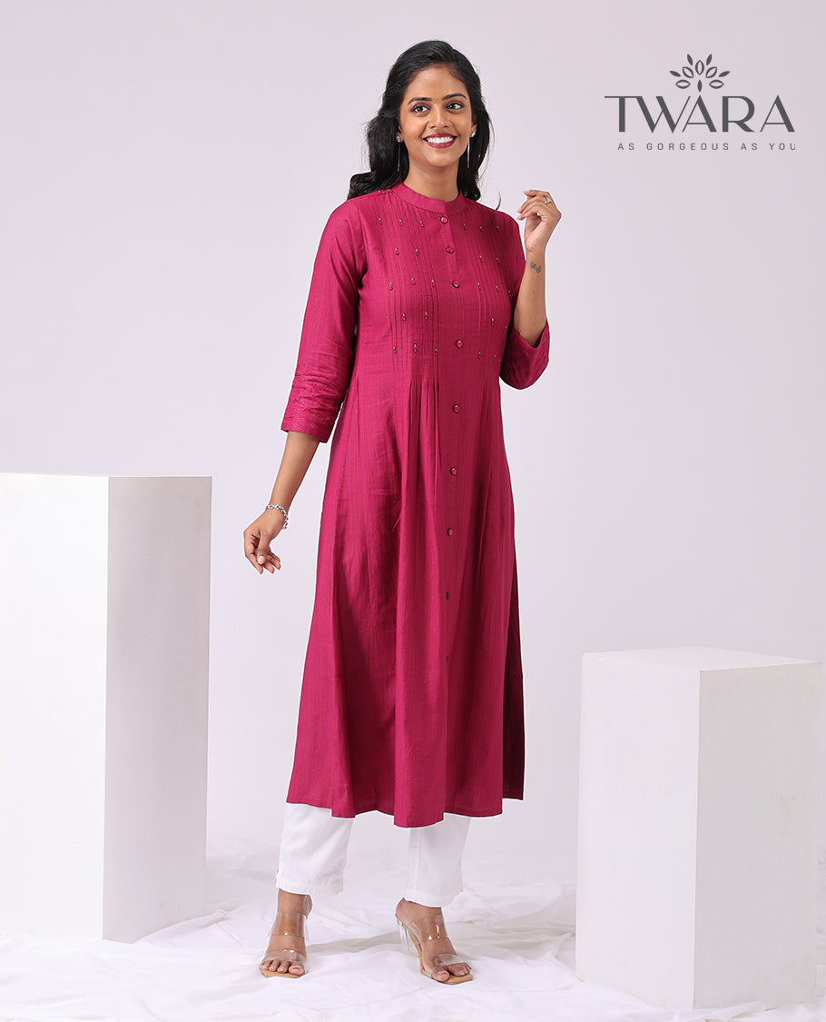 Twara Maroon embroidered motifs chinese neck, 3/4 th sleeve , bleow knee lenght kurti