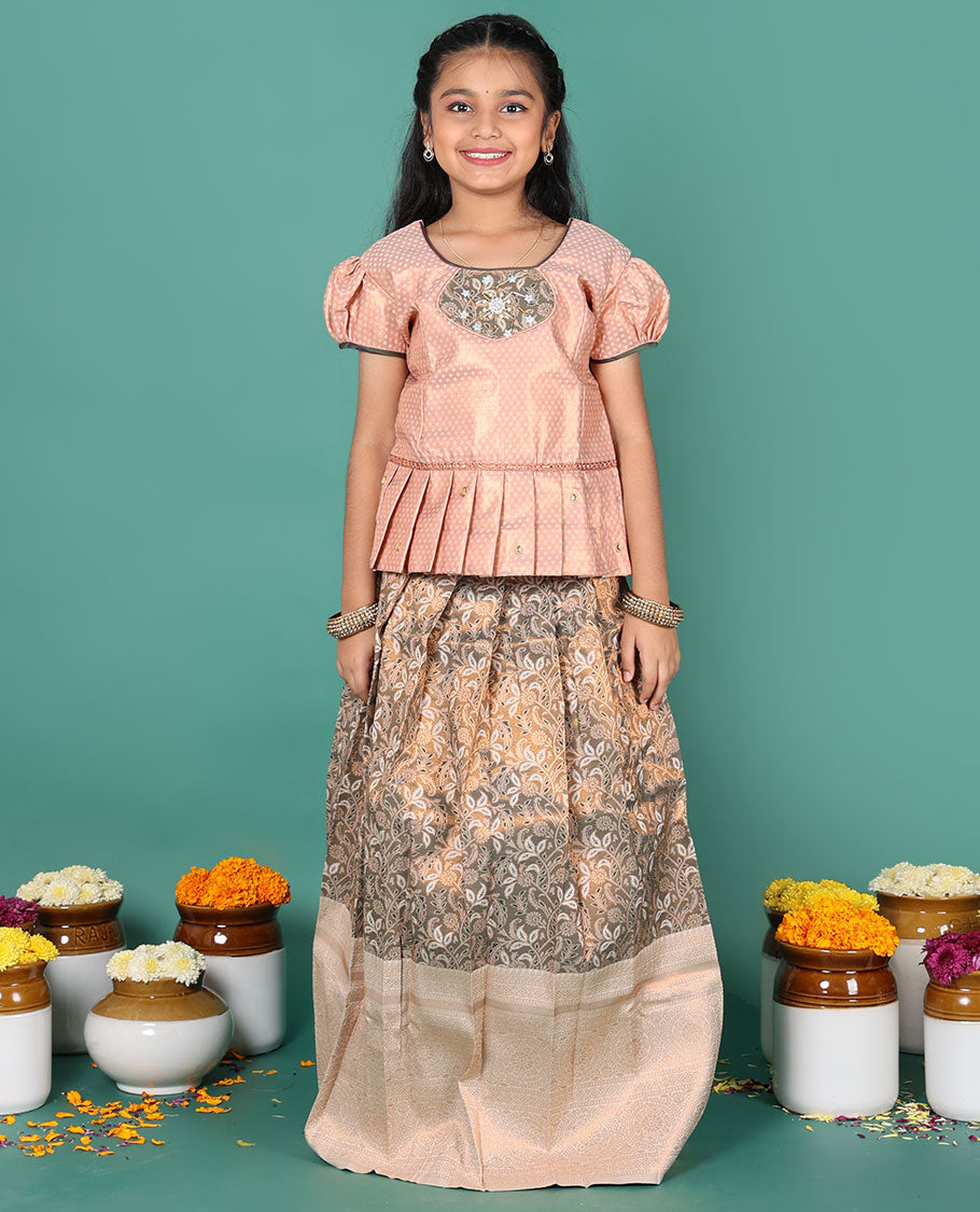 Beige readymade art silk pavadai, floral jacquard & contrast traditional zari border skirt, & jacquard round neck puff-sleeve blouse