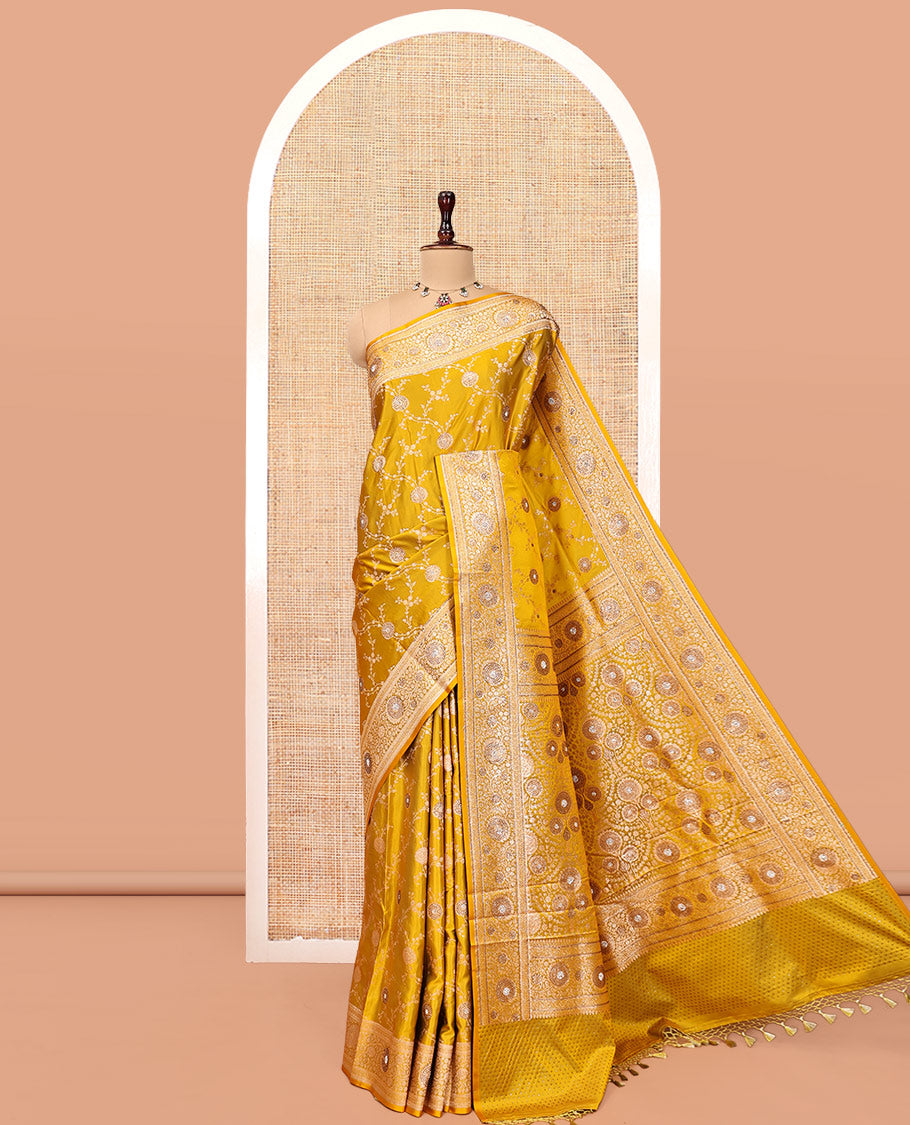Yellow Banarasi Satin Saree, Subtly Sparkled with Floral Jaal Jacquard, a Floral Creeper Border, Intricate Stonework Pallu, and a Matching Blouse