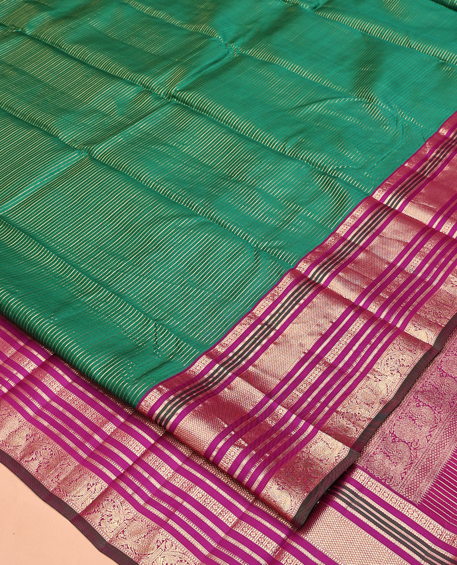 Green-Magenta Vasundhara Silk Saree Features Veldhari and Muthu Stripes, Contrast Border of Muthu,Lavangam,Neli,Mayil Kann, and Mayil, Grand Pallu, and Contrast Blouse