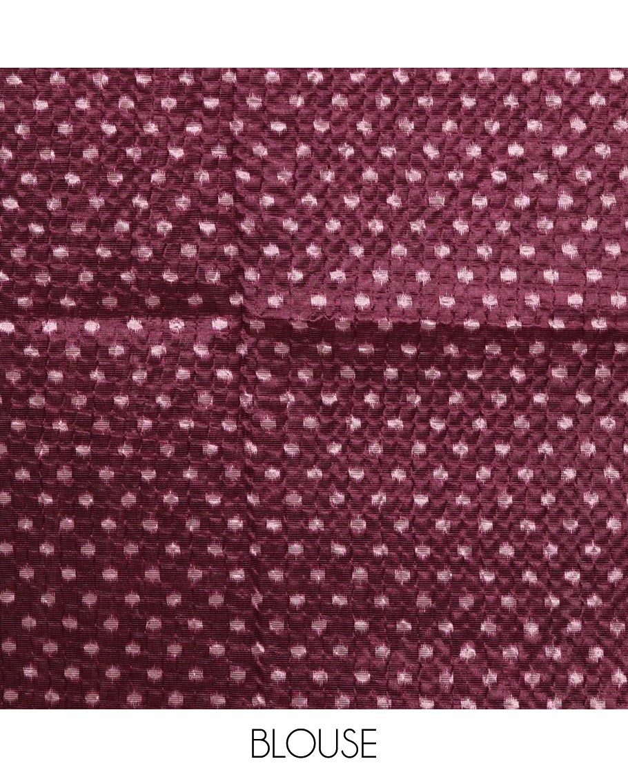 White ikat-style printed Litchi crushed saree, contrast purple ikat border, pallu of ikat chevron & dots & ikat printed blouse
