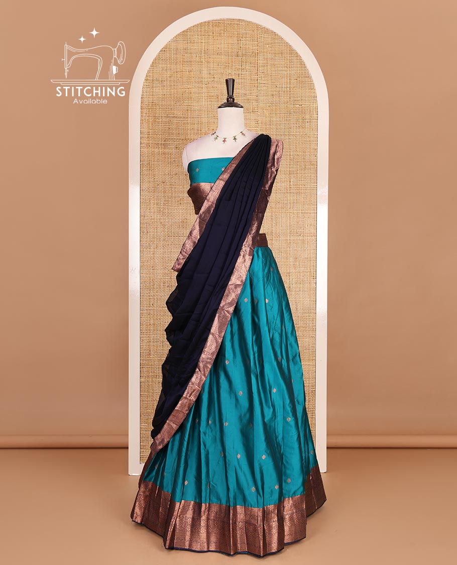 Rama blue taffeta silk half saree, zari buttas with contrast navy blue traditional zari border, matching zari blouse, and contrast plain zari border dhavani