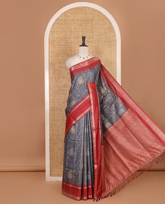 Steel grey floral, manga and striped katan silk saree, contrast rettai pettu temple border of diamond and Greek key design, jaal pallu, and contrast printed blouse