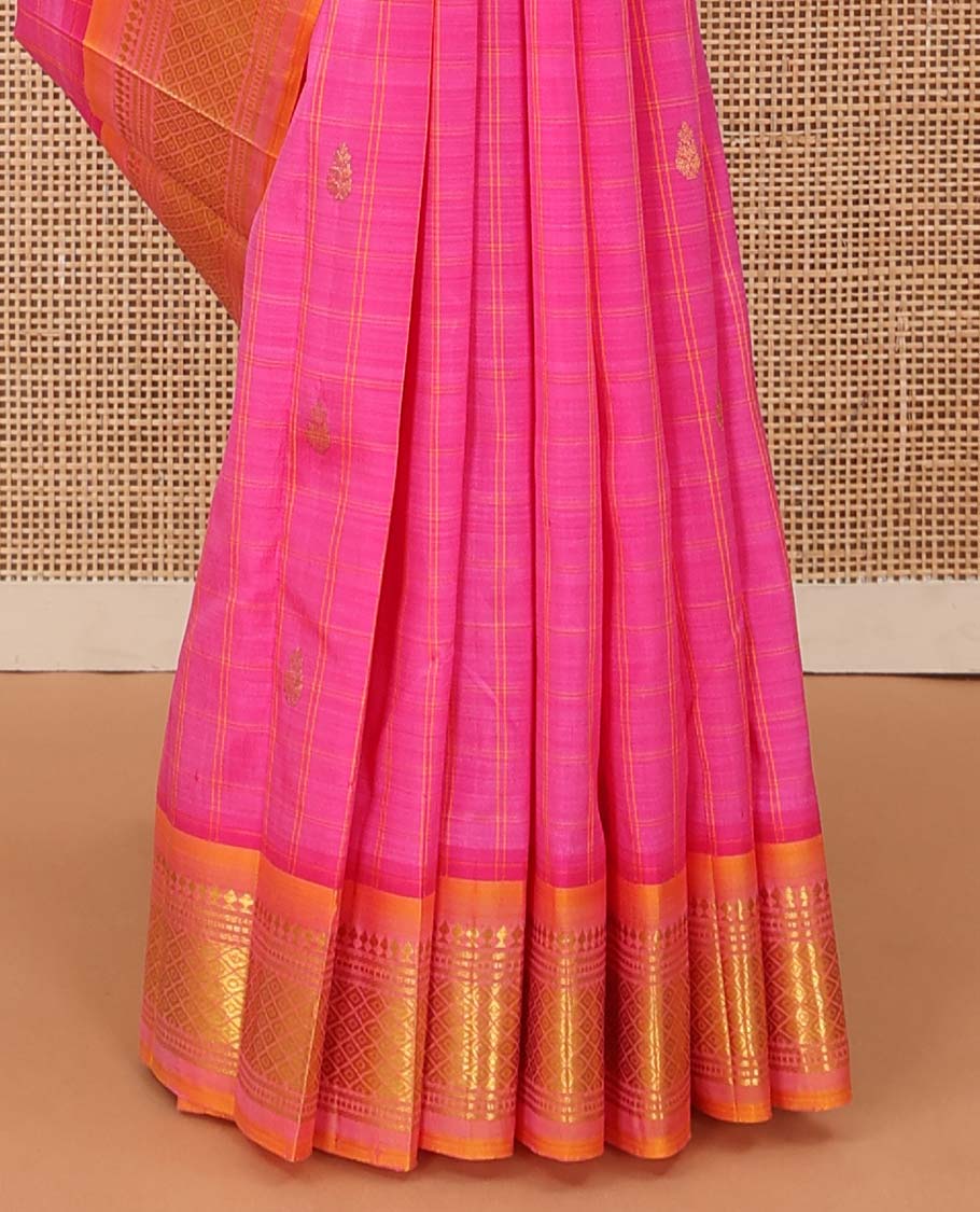 Pink checked and zari buttas Kanchipuram silk saree, contrast one-sided border of paneer sombu, banaras, muthu, and jaal design, and zari design pallu