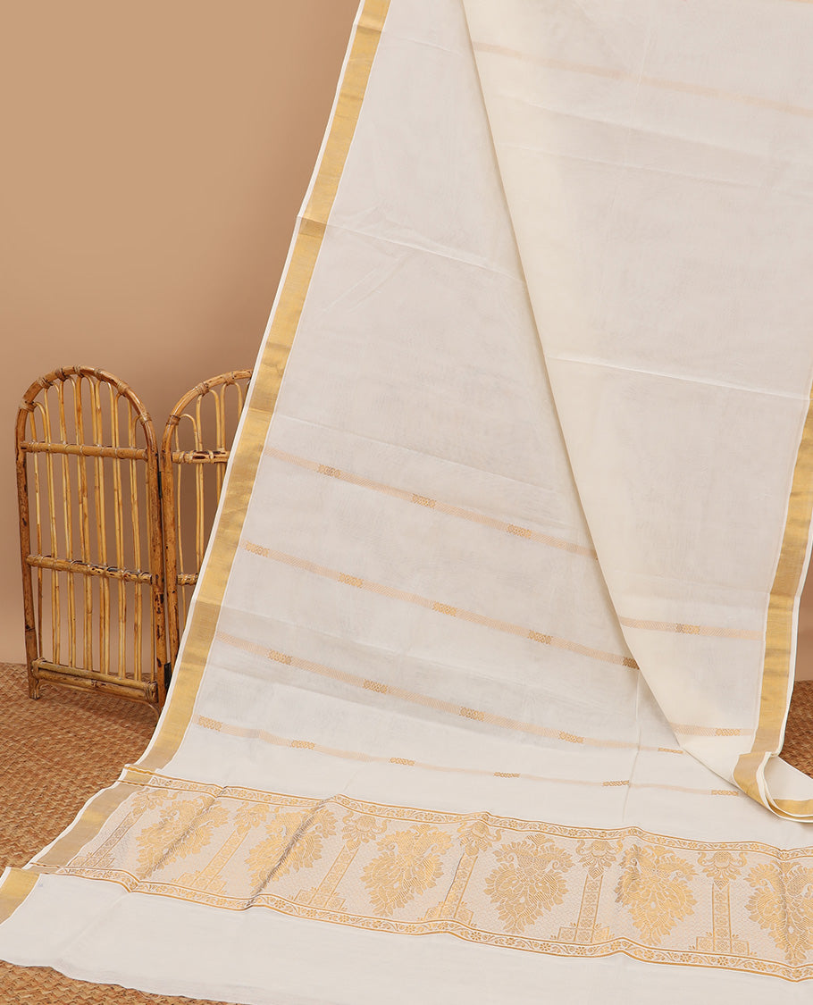 Cream kerala saree with zari designs, zari border & pallu of intricate zari designs