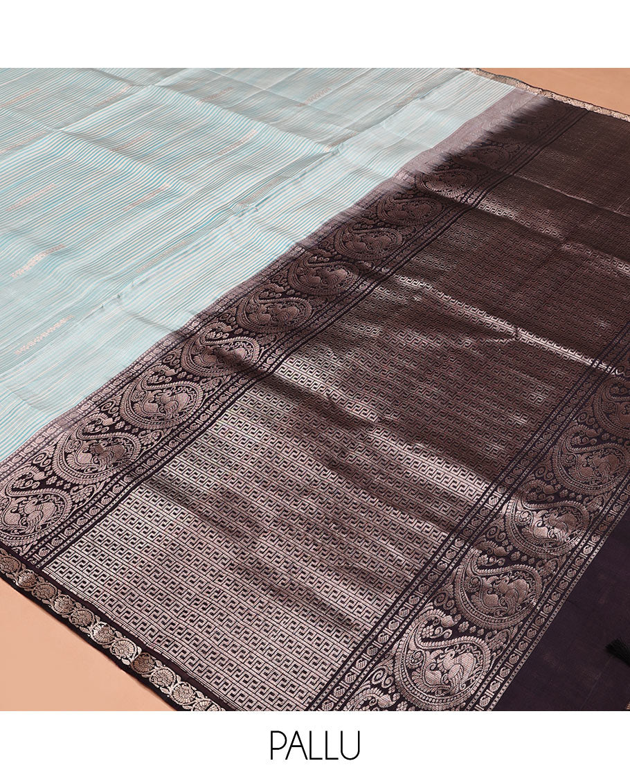 Blue Mayuri Soft Silk Saree, Sparsely Woven with Buttas and Stripes All Over Its Body, Complemented by Contrast Kodi Visiry Border, Pallu of Greek Key, and Manga Designs, and Paired with a Contrast Blouse