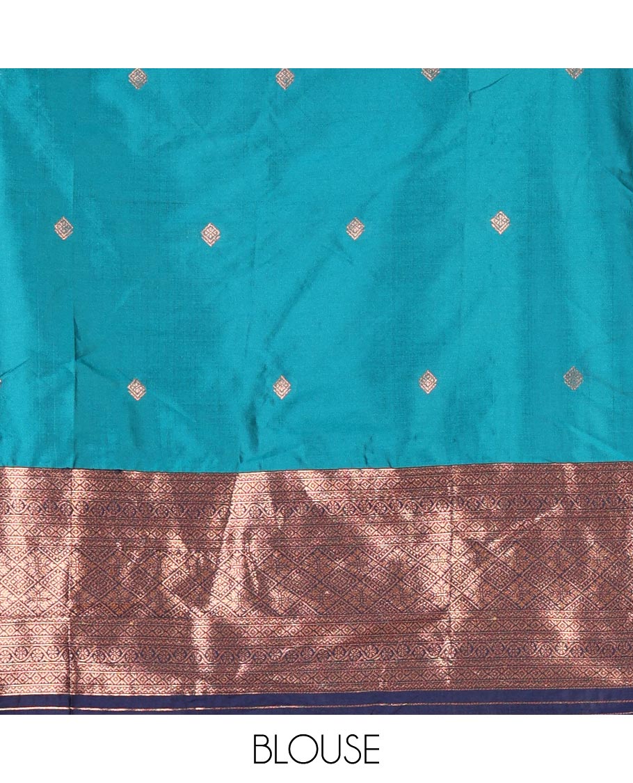 Rama blue taffeta silk half saree, zari buttas with contrast navy blue traditional zari border, matching zari blouse, and contrast plain zari border dhavani