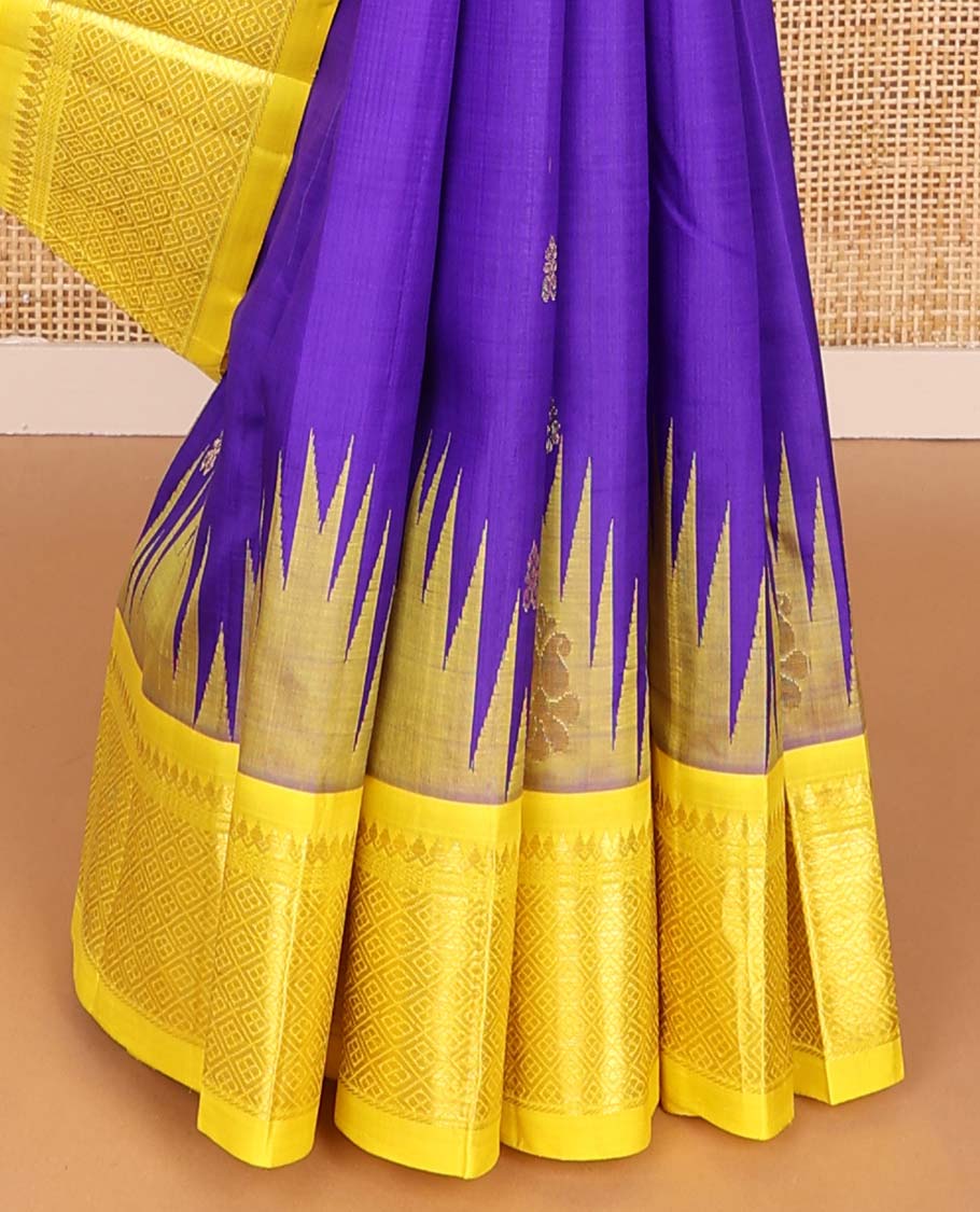 Blue buttas kancheepuram silk saree with contrast border of rekku, thilakam mokku, banaras design & zari design pallu