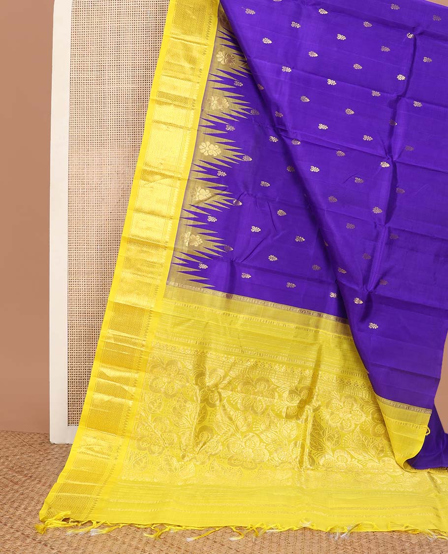 Blue buttas kancheepuram silk saree with contrast border of rekku, thilakam mokku, banaras design & zari design pallu