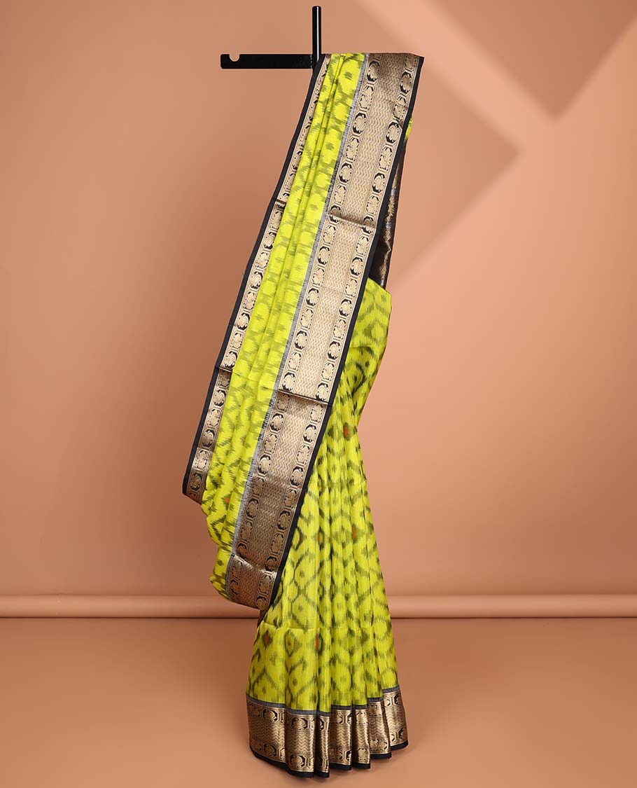 yellow ikkat style floral design soft silk saree with contrast zari border & traditional zari design pallu