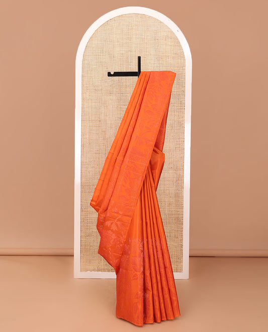 Borderless fanta orange sparsely woven floral design soft silk saree, geometric patterned pallu