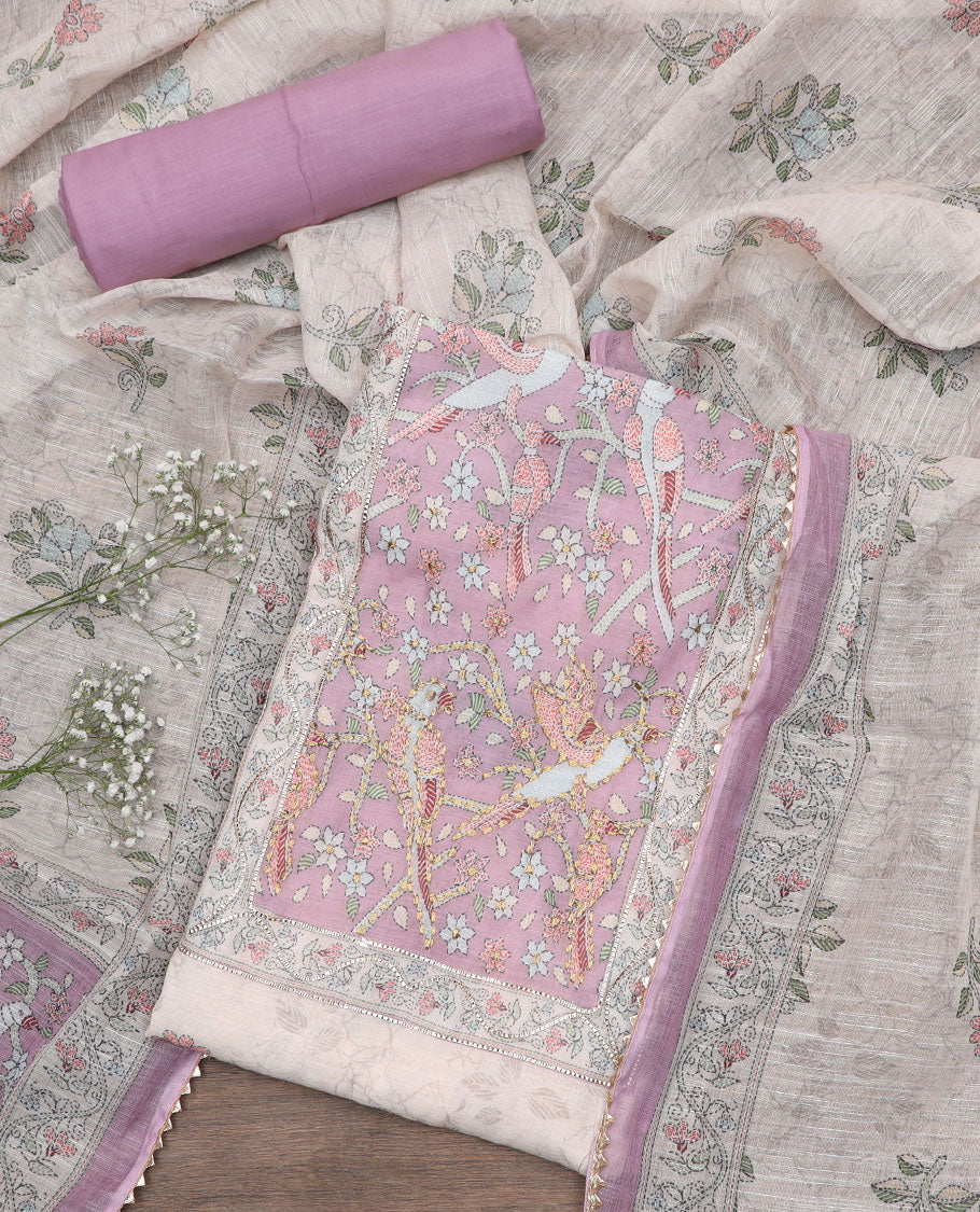 Cream material churidar set, floral-bird neck embroidered top, contrast plain bottom, and a Madhubani-floral printed dupatta