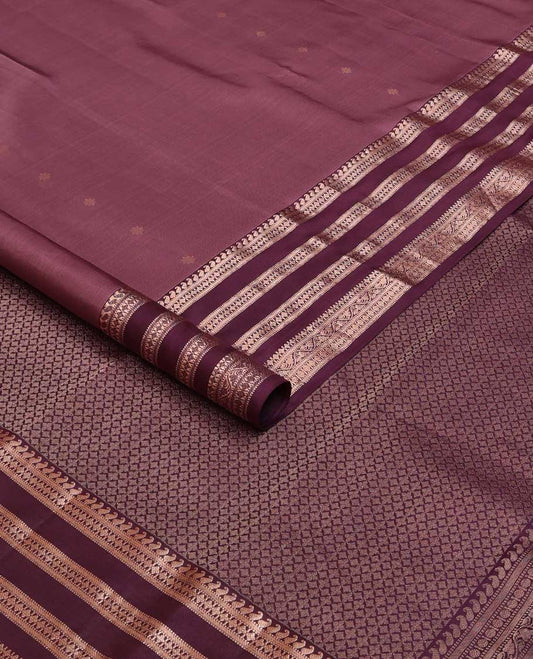Brown silk saree with zari buttas, contrast border of manga, muthu, banaras, diamonds, and zari designs, and jaal pallu