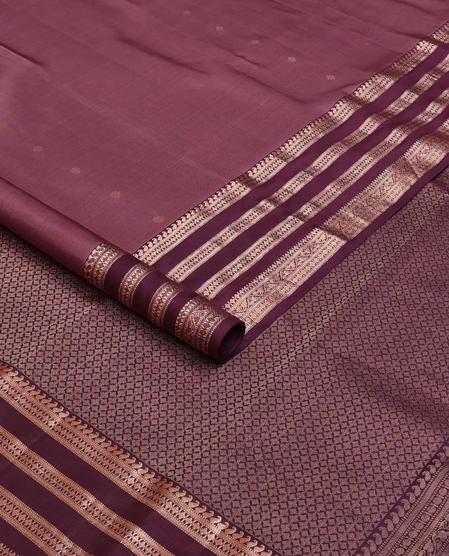 Brown silk saree with zari buttas, contrast border of manga, muthu, banaras, diamonds, and zari designs, and jaal pallu